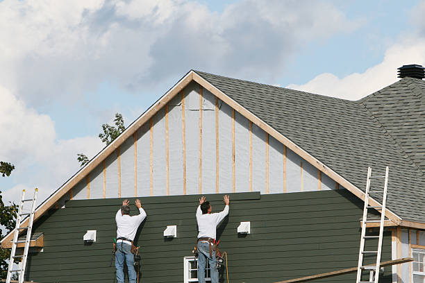 Professional Siding Contractor technician working in Dover, OH